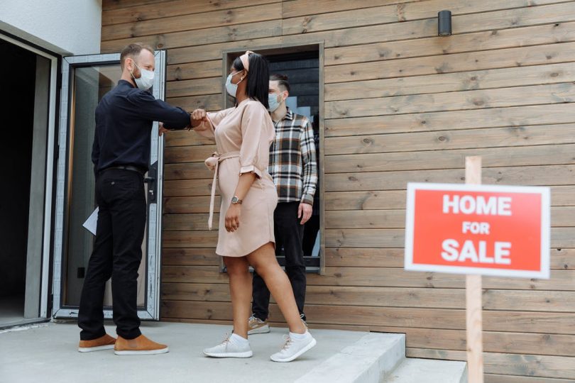 person inspect home for buy