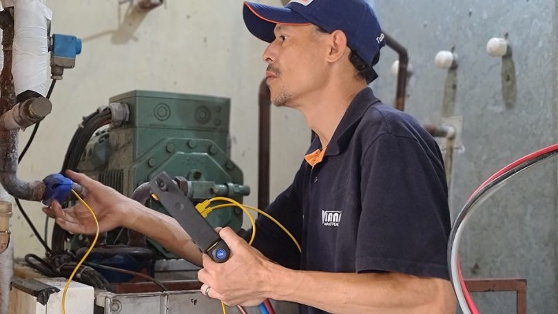 technician checking appliance